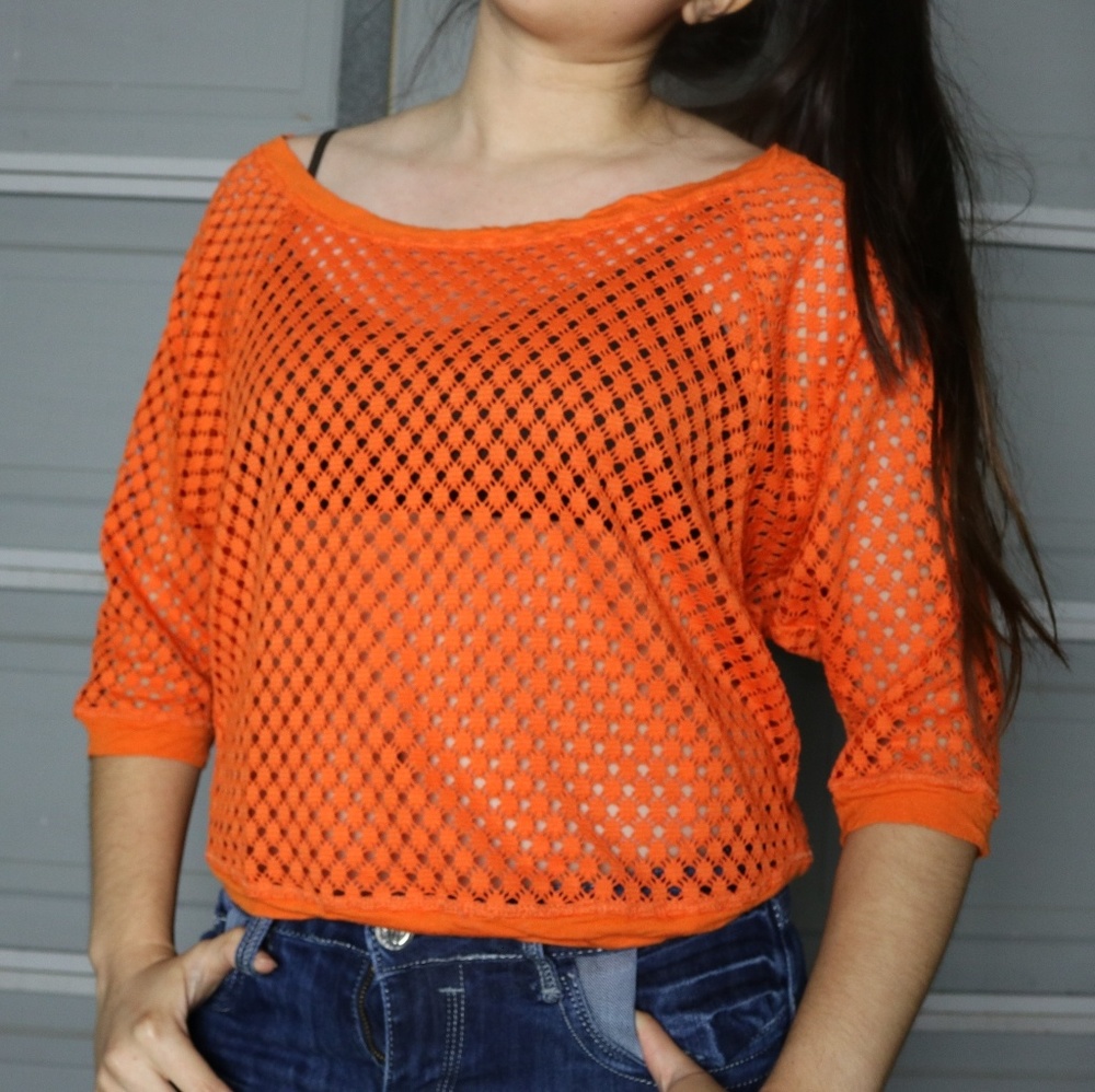 Orange fishnet style shirt